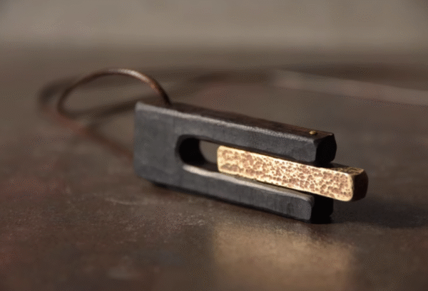 Handmade Thunderstruck Wood & Brass Pendant Necklace: Mysterious Artisan - Crafted Unisex Jewelry - Image 5